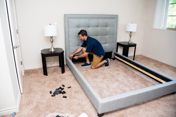 Hire the best movers in town! - The piece of a couch being moved by our mover, while the 2 kids are watching. Hire the best movers in town! - The piece of a couch being moved by our mover, while the 2 kids are watching.