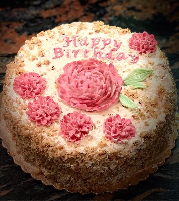 Sacrapatina Cake - A birthday can never have too much cake. This specialty cake is inspired by that Italian Sacrapatina cake￼. The modeling chocolate decorations made this A sweet birthday.￼￼