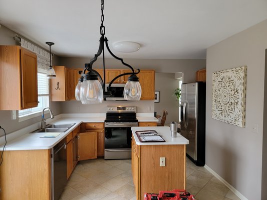 Kitchen Remodel - Kitchen demo, redesigned. Installed cabinets, new lighting, and tile backsplash. Kitchen Remodel - Kitchen demo, redesigned. Installed cabinets, new lighting, and tile backsplash.