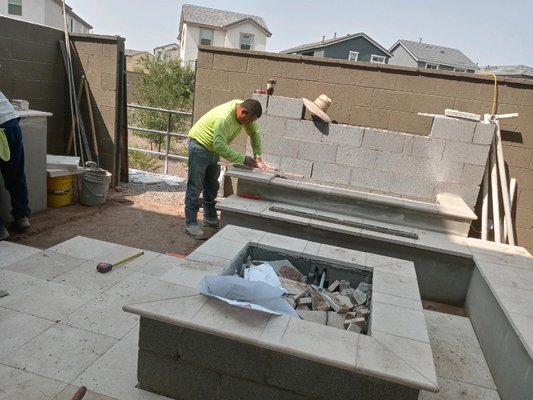Remodeled the landscaping for the backyard 😱😱😱 - Redid the backyard with travertine, built in BBQ and fire pit, gorgeous water feature, and artificial turf