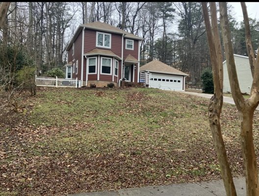 Landscape renovation - This renovation was performed at a property in north Raleigh to mitigate drainage and to create a terraced garden retaining wall. We also installed bermuda grass to add curb appeal. Wildflowers and other plants will be installed at the appropriate season at the top of the planter beds.