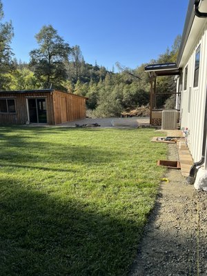 Grass and sprinkles installation - This project was done in grass valley. We prepared the area my leveling the area compacting, run the sprinkler system. Make sure everything was good together and it runs well. Everything workout out and next step was to put low voltage lights around.