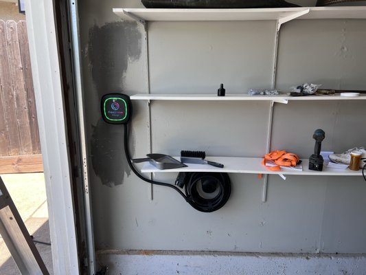 EV charger - This EV charger required load shedding to pass load calculations and not over-load the customers existing panel.