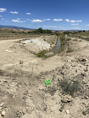 Hot Springs Drain - The diversion line from the hot spring was clogged. We had to dig down and replace the drain line underground. Replaced with larger sized pipe to prevent problem from reoccurring.