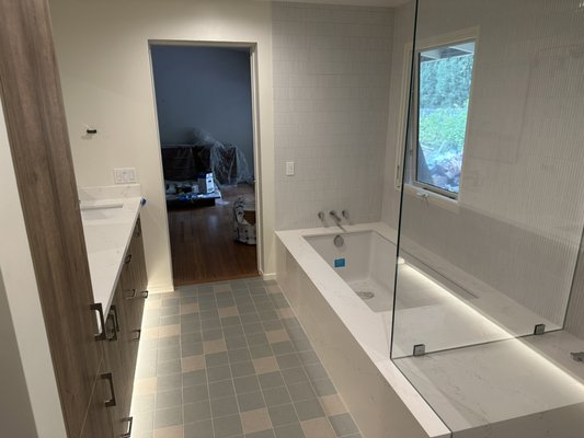 Master bath and master closet addition - This is a master bathroom and walk-in closing addition in the Los Feliz area.
Turn existing shed/storage room in to a livable space wasn’t an easy task due to existing situation and cinder block walls.
Extra deep footing were needed due to addition being a slab foundation and existing house was raise foundation.
After concrete pour we moved to work on all roughs, such as plumbing and electrical.
In this project we worked with client who did all design and sourcing of all finish materials that got purchase months before start of project, helping us to not have set backs.
Tile installation in this bathroom was very intensive with small tiles over two full walls ( floor to ceiling ).
We loved how this modern bath/closet addition turned out. Master bath and master closet addition - This is a master bathroom and walk-in closing addition in the Los Feliz area.
Turn existing shed/storage room in to a livable space wasn’t an easy task due to existing situation and cinder block walls.
Extra deep footing were needed due to addition being a slab foundation and existing house was raise foundation.
After concrete pour we moved to work on all roughs, such as plumbing and electrical.
In this project we worked with client who did all design and sourcing of all finish materials that got purchase months before start of project, helping us to not have set backs.
Tile installation in this bathroom was very intensive with small tiles over two full walls ( floor to ceiling ).
We loved how this modern bath/closet addition turned out.