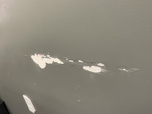 Small drywall patch - The customer had a chair that was constantly being hit against the wall which caused the drywall to crack. Small drywall patch - The customer had a chair that was constantly being hit against the wall which caused the drywall to crack.