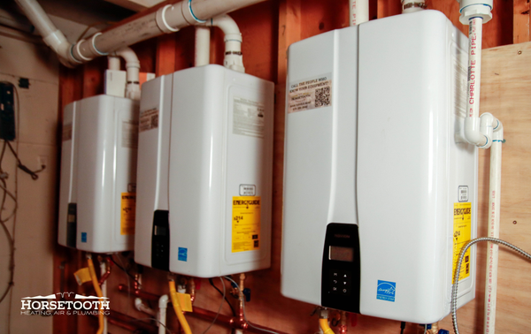 Tankless Water Heater Installation for 28-Unit Apartment Complex - Our plumbing team recently completed a project for a 28-unit apartment complex, ensuring reliable hot water for all residents. We installed three tankless water heaters, providing a total of 600,000 BTUs of on-demand hot water. These units were connected to a 120-gallon storage tank to ensure a steady and reliable supply of hot water across the property.

Tankless water heaters offer efficient, on-demand heating, and when paired with a storage tank, they provide both energy savings and sufficient capacity for multi-family living. This system is an ideal solution for properties looking to optimize space and energy efficiency without sacrificing performance.

We’re proud to deliver expert plumbing solutions to multi-family properties in Northern Colorado and ensure that reliable hot water is always available.