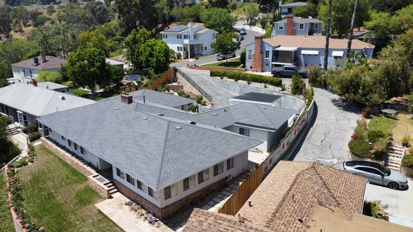Residential Re-Roof Project in Eagle Rock - Re-Roof in Eagle Rock,Ca - This customer had an old outdated roof three tab that has expired. Installed new GAF Reflector Series shingle color stone gray and did their flat patio roof as well. Residential Re-Roof Project in Eagle Rock - Re-Roof in Eagle Rock,Ca - This customer had an old outdated roof three tab that has expired. Installed new GAF Reflector Series shingle color stone gray and did their flat patio roof as well.