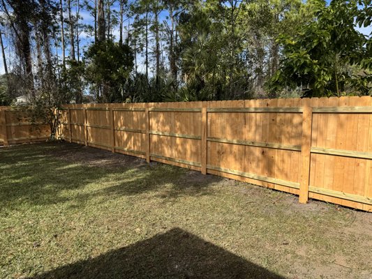 Remove and Replace a wood fence - This fence was 20 years old and needed replacing after the last hurricane blew it down. The costumer wanted a fence to last longer, so we installed a metal post, treated lumber ceder fence with a 6' gate. The metal posts are covered with pickets so they are not visible and look like the rest of the fence. He was very happy with the final product.