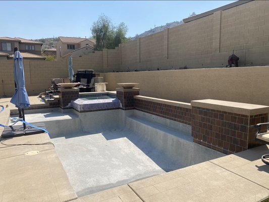Backyard Pool Renovation & Upgrade - Complete pool remodel featuring a raised bond beam upgrade with new stone veneer, updated coping, and refreshed finishes. This transformation modernized the pool’s structure while enhancing visual appeal and creating a more elevated backyard design. Backyard Pool Renovation & Upgrade - Complete pool remodel featuring a raised bond beam upgrade with new stone veneer, updated coping, and refreshed finishes. This transformation modernized the pool’s structure while enhancing visual appeal and creating a more elevated backyard design.