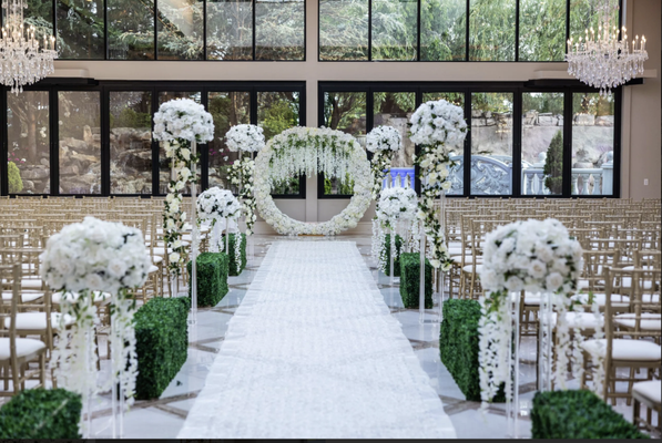Ceremony Decor - Your wedding ceremony is the most meaningful moment of your special day, and at Amore Weddings LLC, we ensure the décor sets the perfect tone for this unforgettable occasion. Our ceremony décor is designed to create a beautiful, serene atmosphere that reflects your unique style and enhances the emotional significance of your vows.
From stunning floral arches and elegant aisle runners to sophisticated lanterns and chic backdrops, our collection offers endless possibilities to bring your vision to life. Whether you dream of a romantic garden setting, a modern minimalist look, or something timelessly elegant, our expertly crafted décor will frame your ceremony with grace and beauty.
We work closely with each couple, ensuring every element of your ceremony décor is tailored to your preferences. With our personalized attention to detail, we’ll help you design a space that not only looks breathtaking but also feels intimate and meaningful.
Trust Amore Weddings LLC to make your ceremony as beautiful as the love you are celebrating, with décor that leaves a lasting impression on you and your guests. Ceremony Decor - Your wedding ceremony is the most meaningful moment of your special day, and at Amore Weddings LLC, we ensure the décor sets the perfect tone for this unforgettable occasion. Our ceremony décor is designed to create a beautiful, serene atmosphere that reflects your unique style and enhances the emotional significance of your vows.
From stunning floral arches and elegant aisle runners to sophisticated lanterns and chic backdrops, our collection offers endless possibilities to bring your vision to life. Whether you dream of a romantic garden setting, a modern minimalist look, or something timelessly elegant, our expertly crafted décor will frame your ceremony with grace and beauty.
We work closely with each couple, ensuring every element of your ceremony décor is tailored to your preferences. With our personalized attention to detail, we’ll help you design a space that not only looks breathtaking but also feels intimate and meaningful.
Trust Amore Weddings LLC to make your ceremony as beautiful as the love you are celebrating, with décor that leaves a lasting impression on you and your guests.
