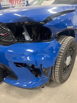 MSP DURANGO - Our team recently took on a massive and complex project involving a Michigan State Police vehicle that collided with a deer at speeds exceeding 100 mph. The impact caused extensive damage to the front end, including critical structural components. This wasn’t an ordinary repair—state trooper vehicles are equipped with specialized features like reinforced bumpers, integrated lighting systems, and advanced electronics, all of which required meticulous attention to detail. Our skilled technicians worked tirelessly to ensure every aspect of the repair met the rigorous standards required for law enforcement use. From sourcing specialized parts to conducting precision alignments and calibrations, we left no detail overlooked. The result was a fully restored vehicle that looked and performed as if it had just rolled off the assembly line, ready for duty once again.