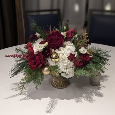 Holiday Events - Whether it is for a residential or office party, Sol Ambiance offers a wide variety of centerpieces and arrangements to create a magical holiday experience for everyone. When designing, we focus on the highest quality decor and materials, and work with our customers to match the color or theme desired. Whether you’d like a magical Winter Wonderland or want to utilize the recognizable colors of your logo or business, we are happy to try and customize to your wants and needs. We offer different types and sizes of arrangements as well. Whether it be small bud vases, standard table centerpieces, or large statement pieces, we will create magic for your to enjoy this holiday season! To learn more about Sol Ambiance holiday decorating services please send us an email at florist@solambiance.com or visit our website at https://solambiance.com/services/holiday-decoration-services. Holiday Events - Whether it is for a residential or office party, Sol Ambiance offers a wide variety of centerpieces and arrangements to create a magical holiday experience for everyone. When designing, we focus on the highest quality decor and materials, and work with our customers to match the color or theme desired. Whether you’d like a magical Winter Wonderland or want to utilize the recognizable colors of your logo or business, we are happy to try and customize to your wants and needs. We offer different types and sizes of arrangements as well. Whether it be small bud vases, standard table centerpieces, or large statement pieces, we will create magic for your to enjoy this holiday season! To learn more about Sol Ambiance holiday decorating services please send us an email at florist@solambiance.com or visit our website at https://solambiance.com/services/holiday-decoration-services.