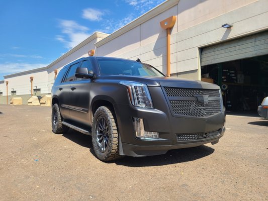 2016 Cadillac Escalade - Avery Satin Black - 2016 Cadillac Escalade
color : Avery Satin Black, 3m gloss black
Full vehicle wrap along with grill to match along with a chrome delete and roof rails wrapped gloss black. Customer was very pleased and shortly after had it shipped to Europe. 2016 Cadillac Escalade - Avery Satin Black - 2016 Cadillac Escalade
color : Avery Satin Black, 3m gloss black
Full vehicle wrap along with grill to match along with a chrome delete and roof rails wrapped gloss black. Customer was very pleased and shortly after had it shipped to Europe.