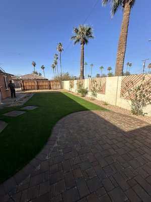 Backyard design and installation - In this project we removed the old grass which was mostly dead. 
We proceeded with installing a new irrigation system for new plants, after installed the new pavers, artificial grass, and decorative rock. We made this backyard functional for the whole family.