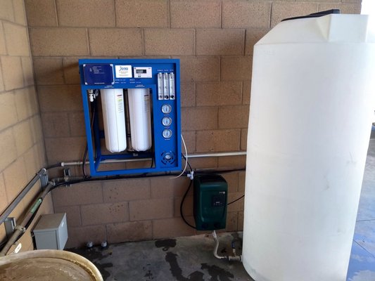 Reverse osmosis for water reuse - Installation and startup of 1000 GPD commercial reverse osmosis system with feed and distribution pump systems. RO treats secondary-treated reclaimed water from industrial truck wash for reuse in a high pressure steam washer. Reverse osmosis for water reuse - Installation and startup of 1000 GPD commercial reverse osmosis system with feed and distribution pump systems. RO treats secondary-treated reclaimed water from industrial truck wash for reuse in a high pressure steam washer.