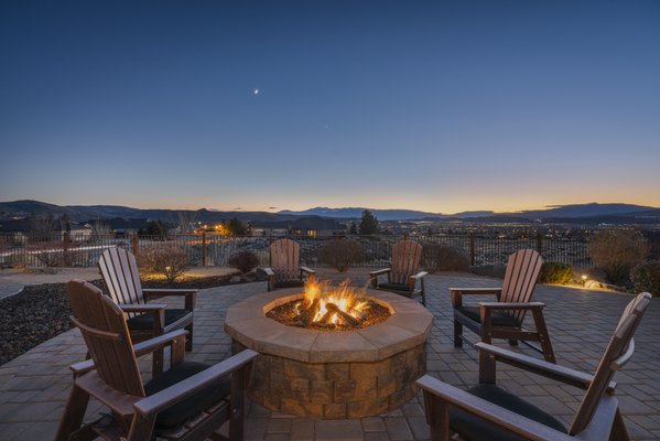 4589 Barbados Drive, Sparks NV 89436 - Enjoy the panoramic mountain, city and valley views from the private backyard of this beautiful home! Professionally landscaped with an expansive paver patio, gas firepit, pergola seating area and a variety of plants and trees to add beauty throughout the year. The chef's kitchen features Thermador appliances (two ovens, gas cooktop and a microwave) plus a WhisperQuiet dishwasher and icemaker. The oversized island is perfect for casual dining, with an elegant wine rack to store your favorite selections. 4589 Barbados Drive, Sparks NV 89436 - Enjoy the panoramic mountain, city and valley views from the private backyard of this beautiful home! Professionally landscaped with an expansive paver patio, gas firepit, pergola seating area and a variety of plants and trees to add beauty throughout the year. The chef's kitchen features Thermador appliances (two ovens, gas cooktop and a microwave) plus a WhisperQuiet dishwasher and icemaker. The oversized island is perfect for casual dining, with an elegant wine rack to store your favorite selections.
