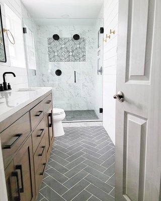 Lynnwood Bathroom - Creating art with Audrey and Jared was a lot of fun! We met several times to come up with this design and they had an amazing vision for the space. The black and white finishes match the flow of their house, the gold brings out their adventurous side, and the nice clean lines leave a lasting impression.
We added a sink, turned two windows into one, moved the toilet to make room for their massive shower with two heads and separate valves. On the fly, we also went with shiplap around the entire space and it looks better than we expected! Lynnwood Bathroom - Creating art with Audrey and Jared was a lot of fun! We met several times to come up with this design and they had an amazing vision for the space. The black and white finishes match the flow of their house, the gold brings out their adventurous side, and the nice clean lines leave a lasting impression.
We added a sink, turned two windows into one, moved the toilet to make room for their massive shower with two heads and separate valves. On the fly, we also went with shiplap around the entire space and it looks better than we expected!