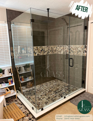 90º Frameless Shower Enclosure (Matte Black Hardware) - This custom-designed Shower Enclosure is meticulously crafted to perfectly complement the layout of your bathroom. Featuring a spacious panel on the side, expertly supported by glass-to-glass clamps, it offers a stunning, unobstructed view through its robust 3/8" thick glass. This elegant enclosure effortlessly enhances the overall aesthetic of the bathroom while providing a sense of openness and sophistication.