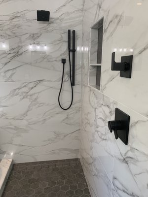 Master bathroom remodel - This master bathroom was in need of a complete overhaul. There’s nothing better than making the client’s vision a reality 🚿🛠🧰
24”x48” tru marmi wall tiles with with the lagos mud 4” hex mesh in the pan and the niche. Master bathroom remodel - This master bathroom was in need of a complete overhaul. There’s nothing better than making the client’s vision a reality 🚿🛠🧰
24”x48” tru marmi wall tiles with with the lagos mud 4” hex mesh in the pan and the niche.