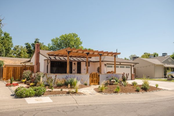 Project 1 - This front yard was redesigned from the ground up, starting with a custom exterior privacy wall offering front, backyard, and driveway access. The wall anchors a stained custom pergola and is finished with a vibrant, drought-tolerant landscape that brings texture, color, and a welcoming feel to the space. Project 1 - This front yard was redesigned from the ground up, starting with a custom exterior privacy wall offering front, backyard, and driveway access. The wall anchors a stained custom pergola and is finished with a vibrant, drought-tolerant landscape that brings texture, color, and a welcoming feel to the space.
