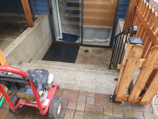 Clogged drain - While arriving to pressure wash the external staircase, we discovered that the drain was completely clogged with debris and leaves. We promptly used a sewer jetter to clear the blockage and then proceeded with our original work.