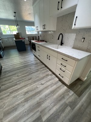 VINYL PLANK - 916-306-9113 - Vinyl plank is a sustainable flooring option that is both affordable and environmentally friendly. It is made from recycled materials and is water-resistant. Vinyl plank also has low VOC (Volatile Organic Compound) emissions, which is great for the environment.

Also, it is easy to clean and is resistant to mold, mildew, and other fungus. Vinyl plank flooring is a popular choice for those who are looking for a versatile flooring option that can be used in many different settings.

It is easy to clean and has a matte finish that is resistant to scratches and dirt.
Additionally, Vinyl plank flooring is a relatively cheap option when compared to other flooring options, making it a good choice for those on a budget.
Vinyl plank flooring is also a good choice for those who are looking for an environmentally friendly flooring option.
It is made from recycled materials, and as a result, it reduces the amount of waste that is produced.
Furthermore, Vinyl plank flooring is a sustainable choice that can last for many years without requiring regular maintenance.
Vinyl plank is a popular choice for those who are looking for a flooring option that is affordable, durable, and easy to maintain. It can also be customized to meet your specific needs and preferences. So, if you are looking for a flooring option that is sustainable, easy to install, and aesthetically pleasing, a vinyl plank may be the perfect choice for you!