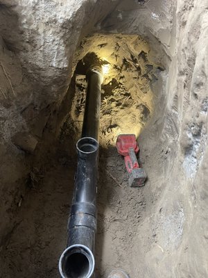 This is the repair of a broken sewer line in a clients home - This was an emergency repair because the whole house backed up and the family could not shower or flush toilets. We dug down and repaired damaged sewer line