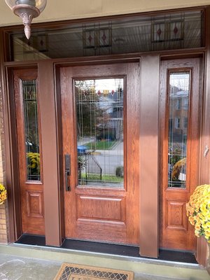 Fiberglass ProVia Door - We gave this front entry a makeover by removing the original opening of glass block and replacing it with a high-efficiency fiberglass door with custom glass. Fiberglass ProVia Door - We gave this front entry a makeover by removing the original opening of glass block and replacing it with a high-efficiency fiberglass door with custom glass.