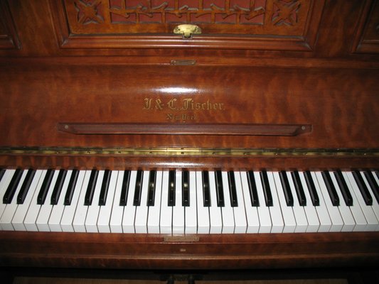 Restoring Piano From 1886 - This J.C. Fischer piano was made in 1886. The exterior case was beautiful and ornate but the interior needed a lot of work. I did a complete overhaul on this instrument including new strings, action regulation, and new key bushings. Restoring Piano From 1886 - This J.C. Fischer piano was made in 1886. The exterior case was beautiful and ornate but the interior needed a lot of work. I did a complete overhaul on this instrument including new strings, action regulation, and new key bushings.