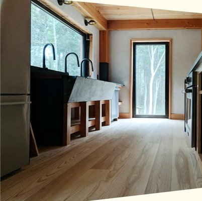 Select Ash Flooring, Hadlyme CT - Select Ash flooring in 7” widths are finished with Craftsbury to enhance the simple elegance of the contrasting heart and sapwood in this minimalist Scandinavian/Japanese-inspired home. Select Ash Flooring, Hadlyme CT - Select Ash flooring in 7” widths are finished with Craftsbury to enhance the simple elegance of the contrasting heart and sapwood in this minimalist Scandinavian/Japanese-inspired home.