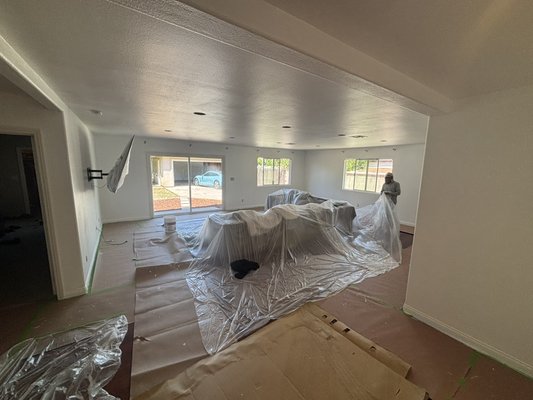 Interior Painting – Living Room & Kitchen Refresh - Full interior painting project including detailed prep, masking, and protection of all surfaces. Completed with a clean, smooth finish for a bright, updated look throughout the living room and kitchen.