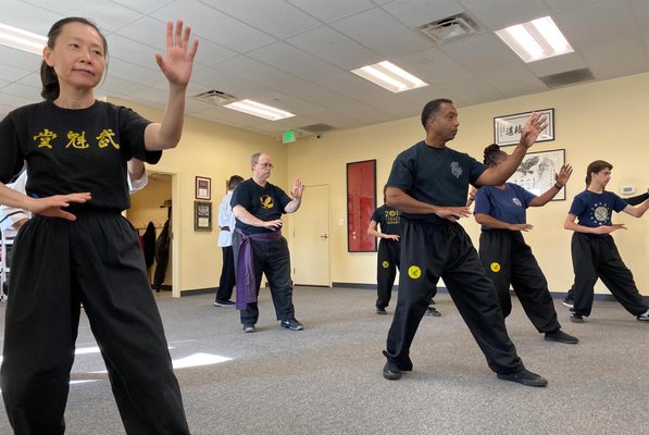 Martial Arts for Adults - Our Owings Mills martial arts studio offers Kung Fu classes for adults of all ages and experience levels. Whether you're a beginner looking to try something new, or an experienced practitioner seeking to deepen your skills, our classes provide a challenging and supportive environment for growth. Our traditional Kung Fu classes focus on forms, practical applications, and self-defense techniques, promoting physical fitness and mental discipline. With our experienced instructors and community-oriented approach, we are committed to helping our adult students achieve their personal goals and realize their full potential. Join us at our Owings Mills studio and discover the many benefits of Kung Fu for adults. Martial Arts for Adults - Our Owings Mills martial arts studio offers Kung Fu classes for adults of all ages and experience levels. Whether you're a beginner looking to try something new, or an experienced practitioner seeking to deepen your skills, our classes provide a challenging and supportive environment for growth. Our traditional Kung Fu classes focus on forms, practical applications, and self-defense techniques, promoting physical fitness and mental discipline. With our experienced instructors and community-oriented approach, we are committed to helping our adult students achieve their personal goals and realize their full potential. Join us at our Owings Mills studio and discover the many benefits of Kung Fu for adults.