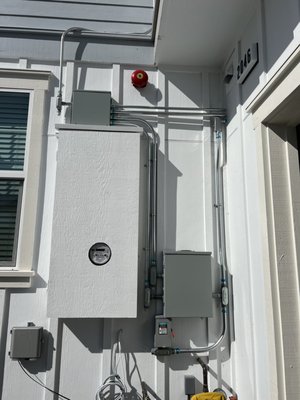 Battery Installation - Battery Installation on a residence.  Required parallel conduits to be installed per NEC code, this one was tricky!