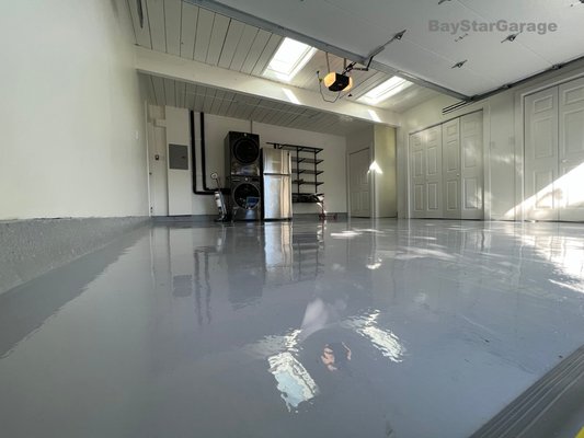 Epoxy Floorings - This shows off our epoxy flooring. See how a professionally finished garage floor can transform the space. Our in house crew installs beautiful, durable polyaspartic and epoxy floor coatings, with every project backed by a 10-year warranty. Quality workmanship from start to finish.