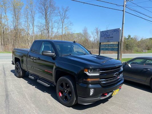 2018 Chevrolet Silverado Z71 RedLine Edition - This One Owner 2018 Chevrolet Silverado LT Z71 Redline Edition 4x4 Double Cab 6.5 ft. SB has a CARFAX Buy Back Guarantee from WS Auto Sales so you can buy with confidence that there are no undisclosed history problems. Professionally detailed and in excellent physical and mechanical condition.
This Silverado has a 5.3L V8 Engine paired with a 6 speed Heavy Duty Automatic Transmission, 4 Wheel Drive and a GU6 Rear Axle Ratio of 3.42 that still get 22 MPG on the highway. The Redline Edition Trim Level has Oversized 20" Premium factory Black Wheels with BRIDGESTONE DUELER 275-55-R20 Tires, heated leather seating, power drivers seat, power windows, locks and mirrors, 2 keys and key fobs with Remote Engine Starter, 8 In. Diagonal Color Touch Screen Navigation W/ Chevrolet Mylink Audio System, Bose Premium Audio System, AM/FM/SXM Radio, CD/MP3 Player with 2 USB connections, AUX input and Bluetooth, Rear Vision Camera System, power sliding rear window, Spray-On Bed Liner, Chevrolet factory Hard Tonneau Cover, Trailering Package with Tow/Haul Mode, Traction Control, Ultrasonic Park Assist, Running Boards and much more.
Financing and Extended Warranties Available. Please call (518) 764-5929 for more information and availability. 2018 Chevrolet Silverado Z71 RedLine Edition - This One Owner 2018 Chevrolet Silverado LT Z71 Redline Edition 4x4 Double Cab 6.5 ft. SB has a CARFAX Buy Back Guarantee from WS Auto Sales so you can buy with confidence that there are no undisclosed history problems. Professionally detailed and in excellent physical and mechanical condition.
This Silverado has a 5.3L V8 Engine paired with a 6 speed Heavy Duty Automatic Transmission, 4 Wheel Drive and a GU6 Rear Axle Ratio of 3.42 that still get 22 MPG on the highway. The Redline Edition Trim Level has Oversized 20" Premium factory Black Wheels with BRIDGESTONE DUELER 275-55-R20 Tires, heated leather seating, power drivers seat, power windows, locks and mirrors, 2 keys and key fobs with Remote Engine Starter, 8 In. Diagonal Color Touch Screen Navigation W/ Chevrolet Mylink Audio System, Bose Premium Audio System, AM/FM/SXM Radio, CD/MP3 Player with 2 USB connections, AUX input and Bluetooth, Rear Vision Camera System, power sliding rear window, Spray-On Bed Liner, Chevrolet factory Hard Tonneau Cover, Trailering Package with Tow/Haul Mode, Traction Control, Ultrasonic Park Assist, Running Boards and much more.
Financing and Extended Warranties Available. Please call (518) 764-5929 for more information and availability.