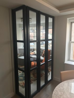 Bifold door installation - These doors were installed in a modern apartment at 6th Avenue and 73rd Street in Manhattan. They effectively divided the room while adding a beautiful, contemporary touch to the space.