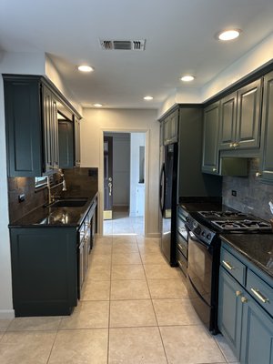 Cabinet Painting Elegant Finish - We painted these cabinets to an elegant finished with golden handles. We added soft close hardware so the doors don't slam and added golden handles for a better look. 10/10!