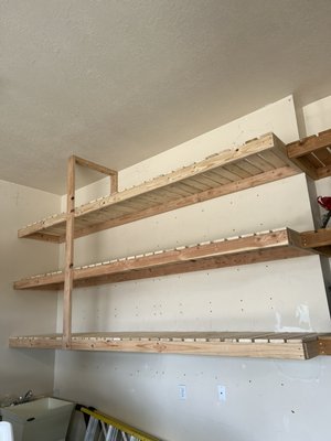 Garage Shelves - Redstone Handyman can build sturdy wood shelving to help organize and optimize your garage area. Contact us to see how we can complete a project for you!