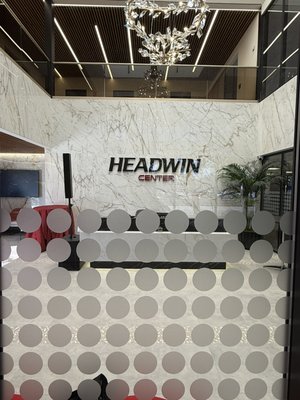 Headwin Center Custom circle pattern - This building went through a complete gutting, part of the remodel was adding a lot of glass partitions. To avoid people running into the glass as well as giving some depth, this circle pattern was designed by the architect. Though it looks simple, it required using 2 laser levels to make sure the circles overlapped perfectly when the sliding doors were opened. Overall it looked very elegant and added a classy touch to the lobby and offices Headwin Center Custom circle pattern - This building went through a complete gutting, part of the remodel was adding a lot of glass partitions. To avoid people running into the glass as well as giving some depth, this circle pattern was designed by the architect. Though it looks simple, it required using 2 laser levels to make sure the circles overlapped perfectly when the sliding doors were opened. Overall it looked very elegant and added a classy touch to the lobby and offices