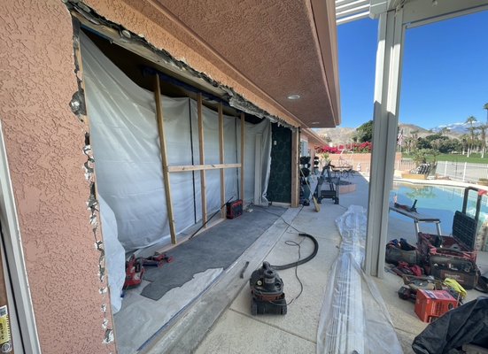 Remodel of sliding doors - This was a remodel in which we took their existing sliding doors and window and removed them and installed a large four panel multi slide unit in which stacked to one side so they can open up their space to access their pool or indoor outdoor live-in space enlargement