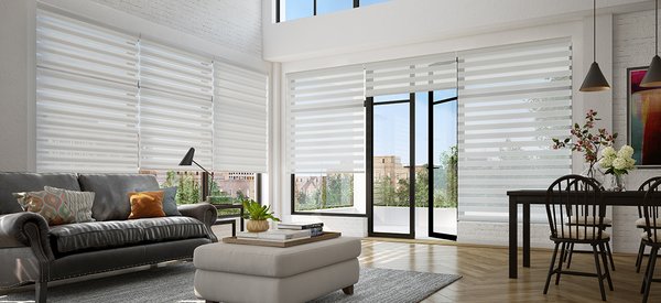 Banded Shades - Banded Shades do more than just control light and privacy. They do it with flexibility and precision. Choose a little or a lot of view-through; a sliver or substantial amount of light. Your search for a multifaceted solution is over with beautiful, contemporary Banded Shades.

Product Overview

Premium roller shade with alternating bands of sheer and opaque fabric. As the shade raises and lowers, fabric bands glide smoothly past each other allowing levels of light control, view-through, and privacy.
28 gorgeous styles with well over 100 choices in on-trend colors; various band sizes ranging from 2″ to 51/2″ accommodate most every window size.
Translucent and light-dimming fabrics are blended with soft sheer or intricate mesh fabric.  The degree of opacity varies depending on the fabric style.
The shade completely disappears inside the headrail when raised for a full outdoor view.
Control and Design Options

Full range of options: Somfy automation, standard cord loop (beaded chain available), retractable cord system for more precise shade positioning, plus affordable,rechargeable PowerWand™
Headrail cassette is available in beige, black, dark brown, silver and white, and comes with a matching fabric insert for a beautiful coordinated appearance.
Fabric-wrapped bottom rail is standard; non-wrapped bottom rail is optional.
Two-on-one headrail is available for standard cord loop and retractable cord.