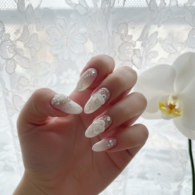 Nails design - Soft, elegant, and timeless 🤍✨

This beautiful set features a delicate white ombré design with 3D flowers and sparkling rhinestone details 🌸💎 Perfect for weddings, special occasions, or anyone who loves a classy and romantic look.

We put love and care into every detail to make your nails truly stand out 💅💖

Book your appointment today or walk in anytime — we’re ready to make you shine!

#CocoSalon #PearlandNails #OmbreNails #3DNails #WeddingNails #ElegantNails #NailDesign