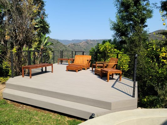 Azek Composite Hillside Deck - Azek (Timbertech) composite decking (in Coastline) with see-through stainless-steel railing system to maximize the beautiful view!

Have any questions? Give our office a call or text at (818) 491-7301!