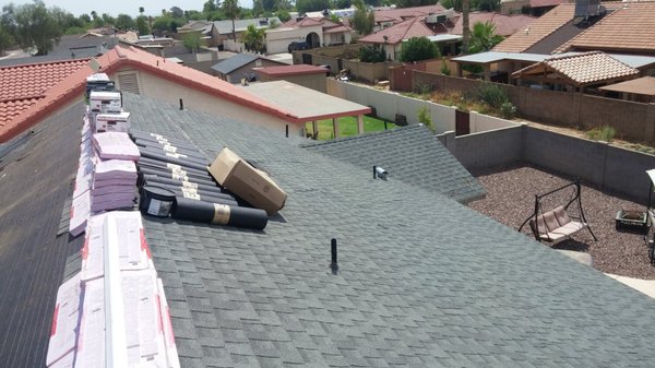 Shingle Roof Replacement in Tucson - We removed and replaced this roof for our customer after some storm damage revealed some leaks. We assisted the family with the insurance claim and they were able to have the roof replaced with the insurance settlement. Shingle Roof Replacement in Tucson - We removed and replaced this roof for our customer after some storm damage revealed some leaks. We assisted the family with the insurance claim and they were able to have the roof replaced with the insurance settlement.