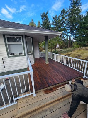 deck staining job in Langley - we sanded whole wooden deck in order to get rid of the previous paint and the applied 2 coats of stain deck staining job in Langley - we sanded whole wooden deck in order to get rid of the previous paint and the applied 2 coats of stain