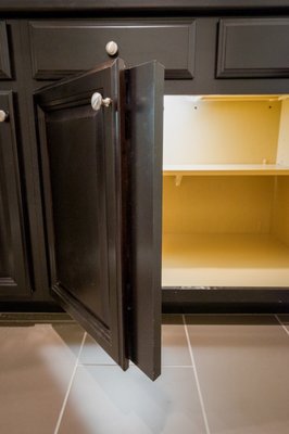 False Stiles - False Stiles get rid of the post in the middle of cabinet openings, making a wider opening to put bigger-sized roll-out shelves inside, gaining more space for your items