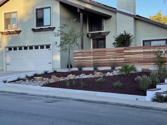 Front yard remodel - A complete yard remodel with a beautiful river bed