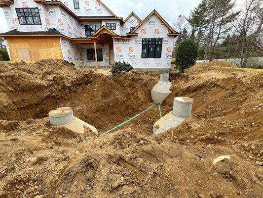Suffolk County Health Dept. Septic System for a 5 bdrm house. Homeowner added bedroom to original house - 5 bdrm septic system consists of 1500 gallon septic tank and (2) overflow cesspools with independent lines from septic tank to over flows. Additionally there is a cross line connecting the 2 overflow cesspools and a 4 inch "cleanout" raised to grade between the house and septic tank. That is the basic septic system. There is more involved i.e. measurements, future expansion etc. Suffolk County Health Dept. Septic System for a 5 bdrm house. Homeowner added bedroom to original house - 5 bdrm septic system consists of 1500 gallon septic tank and (2) overflow cesspools with independent lines from septic tank to over flows. Additionally there is a cross line connecting the 2 overflow cesspools and a 4 inch "cleanout" raised to grade between the house and septic tank. That is the basic septic system. There is more involved i.e. measurements, future expansion etc.