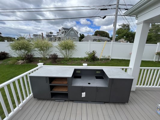 Outdoor kitchen - This material is made to withstand heat and cold.